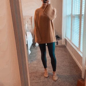 Medium turtleneck sweater with bell sleeves